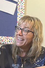 Picture of the principal smiling.